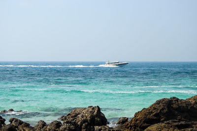 Scenic view of sea against clear sky