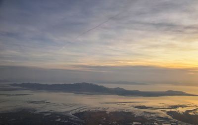 Scenic view of landscape against sky during sunset