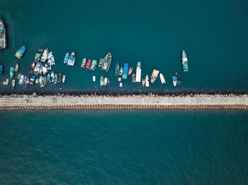 Small fishing boats near the wave barrier in aberdeen bay hong kong