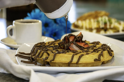 Close-up of coffee cup on table