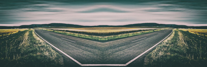 Panoramic view of rural landscape against sky