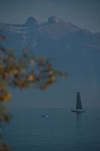 Scenic view of sea against mountain