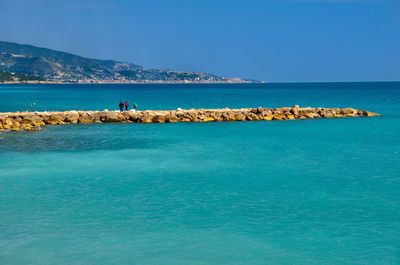 Scenic view of sea against clear sky