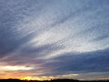 Low angle view of dramatic sky during sunset