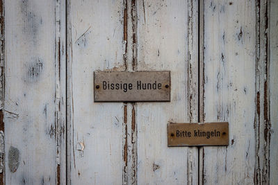 Sign on old wooden door