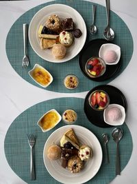 High angle view of breakfast served on table