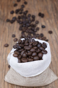 Close-up of coffee beans on table