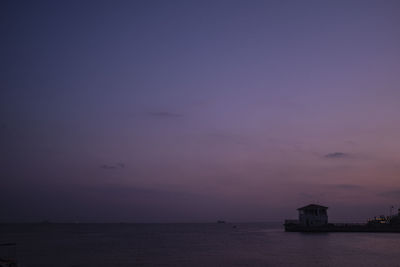 Scenic view of sea against sky at sunset
