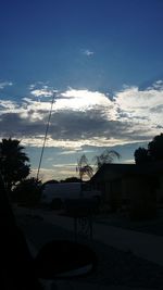 Scenic view of mountains against cloudy sky