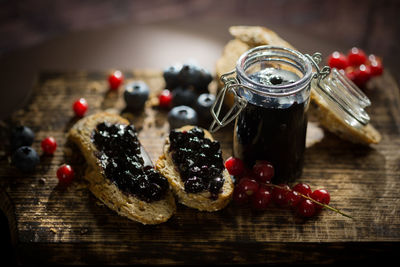 Close-up of fruits in jar on table