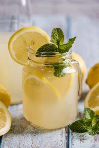 Close-up of drink in glass jar on table