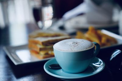 Coffee cup on table