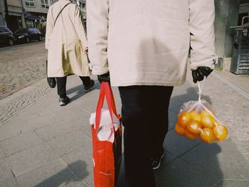 Midsection of man with ice cream