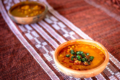 High angle view of soup in bowl on table