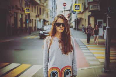 Portrait of woman standing in park