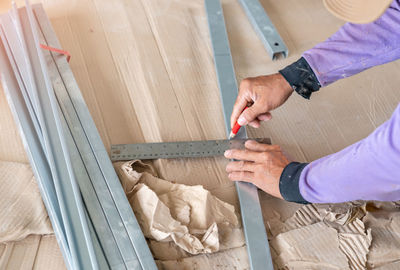 Cropped image of man working at workshop