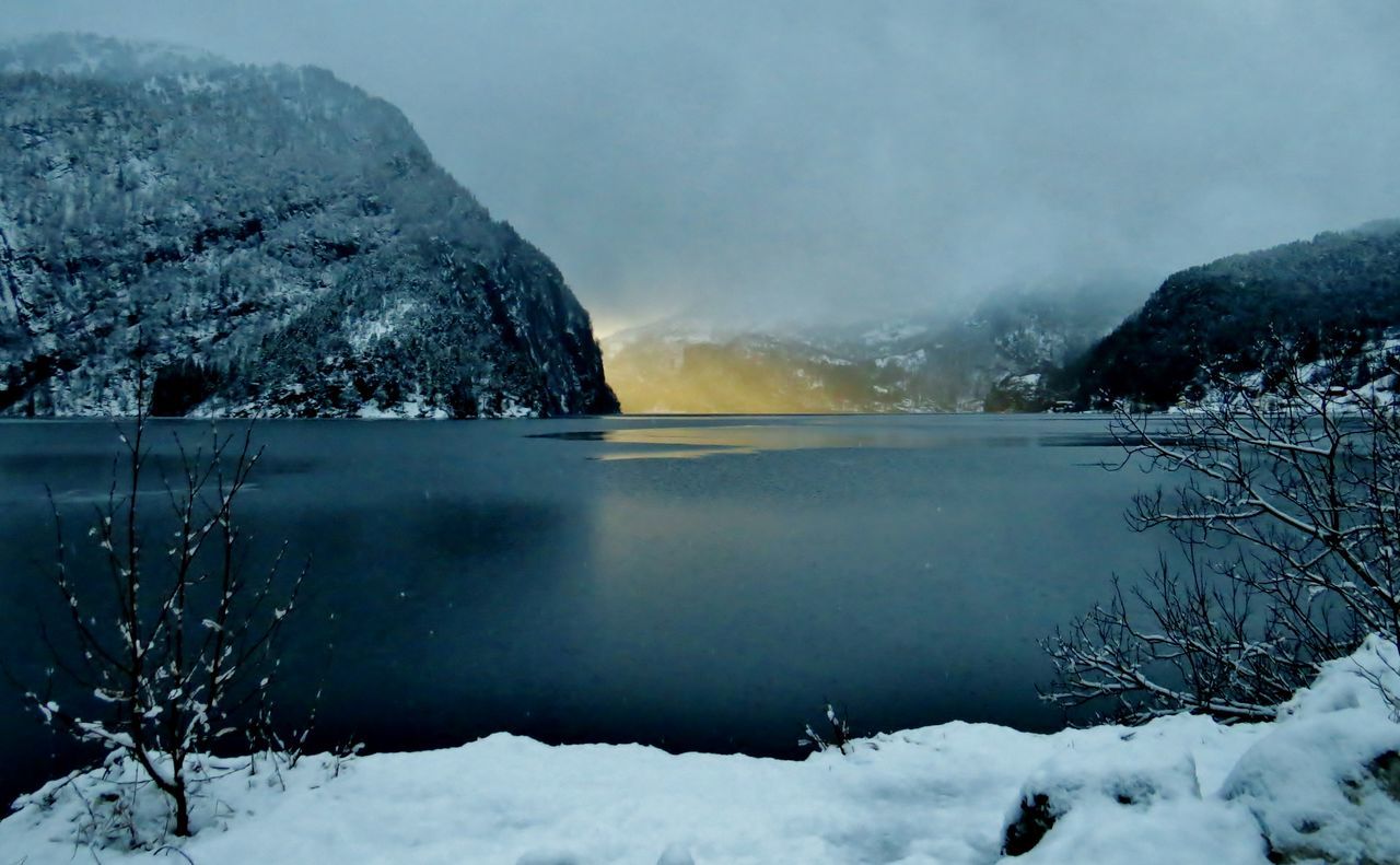 nature, water, beauty in nature, cold temperature, winter, reflection, lake, tranquility, scenics, tranquil scene, snow, outdoors, sky, no people, landscape, tree, day, mountain