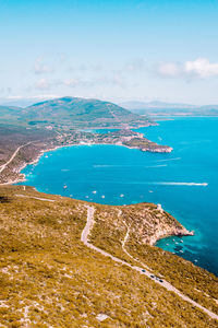 High angle view of bay and sea against sky