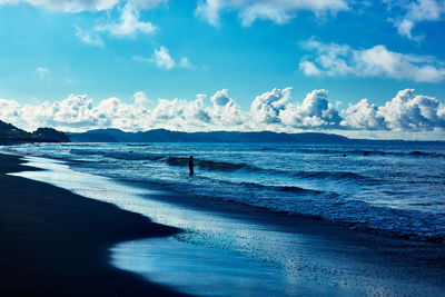 Scenic view of beach against sky