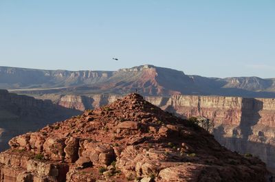 View of mountain range against clear sky