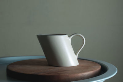 Close-up of coffee cup on table