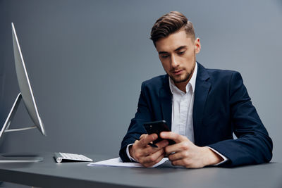 Young man using mobile phone