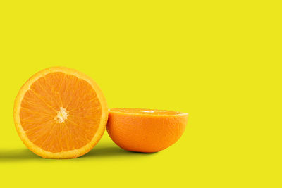 Close-up of oranges against orange background