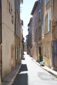 Narrow alley along buildings