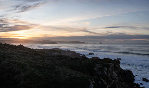 Scenic view of sea against sky during sunset