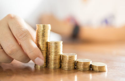 Close-up of coins on table