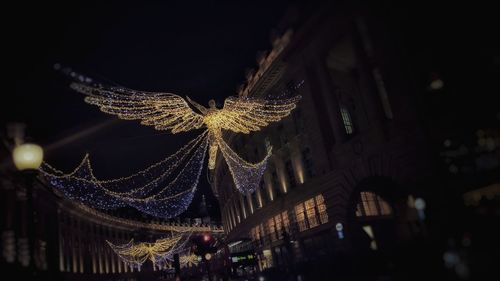 Close-up of illuminated christmas tree at night