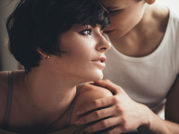 Close-up portrait of young couple