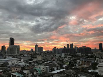 Cityscape against sky during sunset