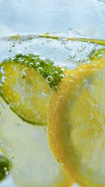 Close-up of lemon slice in water