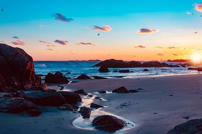 Scenic view of sea against sky during sunset