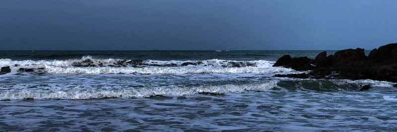 Scenic view of sea against clear sky