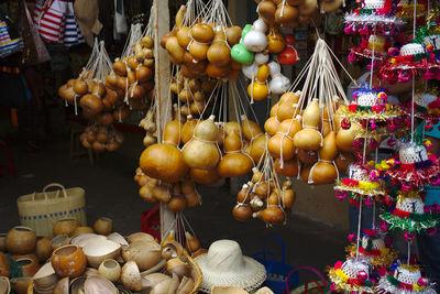 Various objects hanging for sale at market