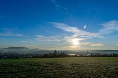 Scenic view of field against sky