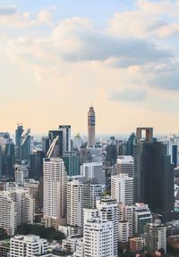 Modern buildings in city against sky