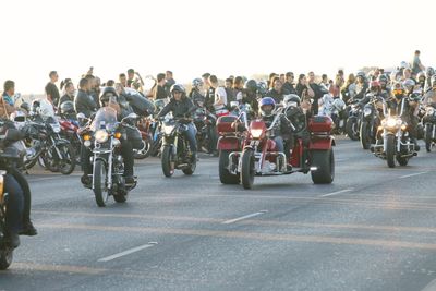 Group of people on road in city