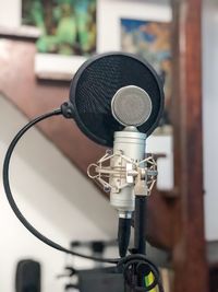 Close-up of microphone in recording studio