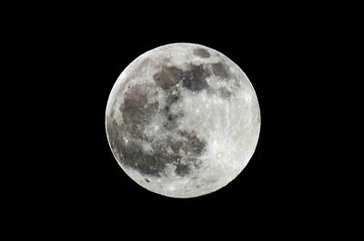 Full moon against clear sky at night