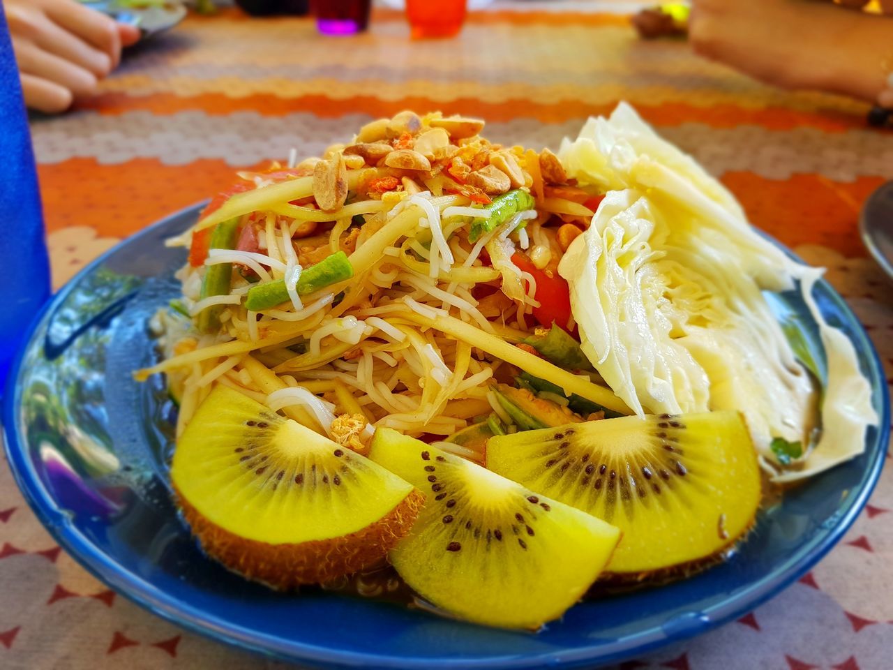 food and drink, food, freshness, healthy eating, ready-to-eat, close-up, wellbeing, indoors, table, fruit, serving size, focus on foreground, plate, still life, one person, bowl, hand, indulgence, vegetable, snack, temptation, chopped