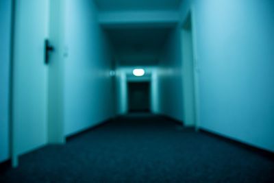 Illuminated corridor of building