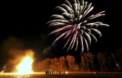 Firework display at night