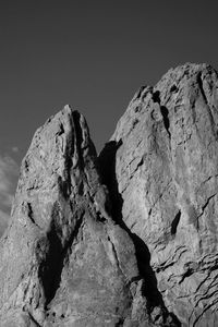 Low angle view of rock formation against clear sky