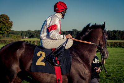 Man riding horse