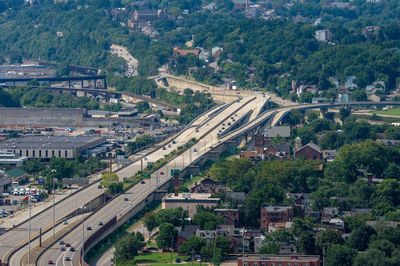 High angle view of vehicles on road in city