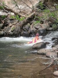 Man surfing in river