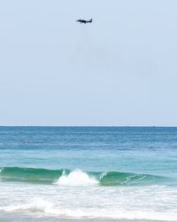 Waves flying over sea